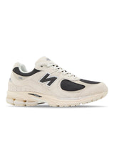 U2002RN - Arid Stone-schoenen-New Balance-Butler Loftet